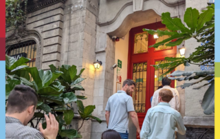 Group of people walking into building