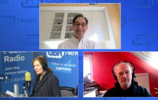 Screenshot of a YouTube livestream of Boston Public Radio. The background is light blue. The top center image is of Corby Kummer, executive director of Food & Society (he is wearing a white button down shirt and behind him is a glass fronted cabinet and coral colored walls). The botton left is Margery, a host of Boston Public Radio in the studio, seated before a microphone. The Boston Public Radio logos are featured behind her. Co-host Jim is in the lower right wearing headphones and seated in a room with red walls.