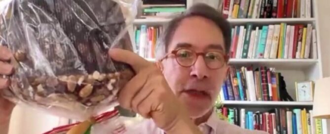 Corby Kummer holds up a panettone, a traditional Italian bread dessert made during the Christmas holidays.